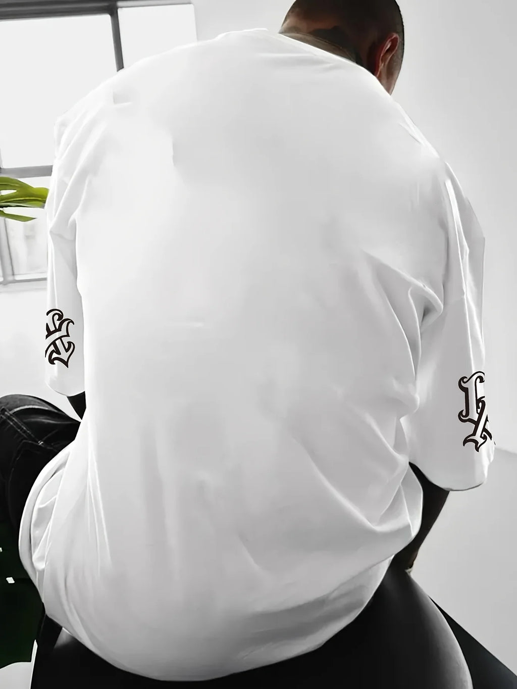 The 2025 summer new men's T-shirt is a casual fashionable and creative line letter print round-neck T-shirt with polyester men